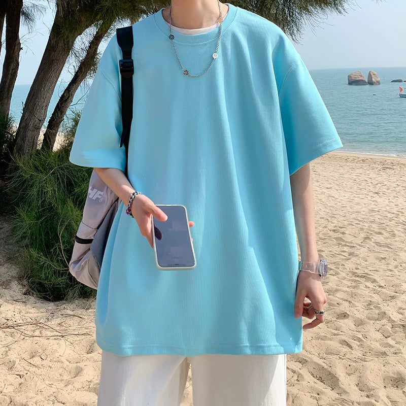White short sleeved T-shirt for men in summer, made of pure cotton, weighing heavily. 2026 new item for teenagers, half sleeved base shirt, loose and trendy